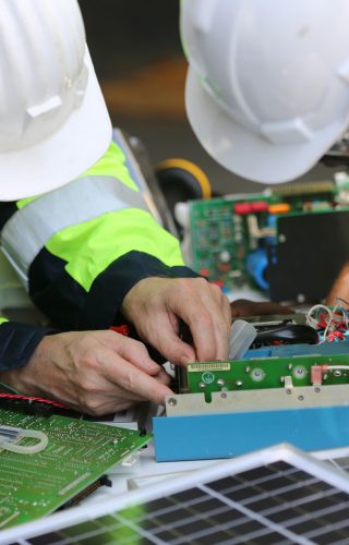 workers-assemble-energy-system-with-solar-panel-fo-2023-11-27-04-51-12-utc